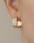 Brinco Argola U Cravejada de Microzirconias no Dourado - comprar online
