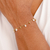 Pulseira Elos com Pérolas e Bolinhas Lisas no Dourado na internet