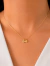 Colar com Coração Liso e Patinha Cravejada no Dourado - comprar online