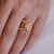 Anel Entrelaçado Liso no Dourado