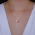 Colar Letra de Microzirconias com Zirconia Quadrada no Dourado com Rosa Claro - loja online