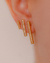 Brinco Trio de Palitos de Microzirconias e um Liso no Dourado