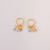 Brinco Argolinha com Tiffanys Penduradas no Dourado na internet