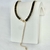 Colar Choker Riviera Baguetes de Cristais Negros no Dourado na internet