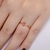 Anel Fino com Zirconia Oval e Redonda Rosa no Dourado na internet