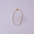 Pulseira Infantil de Pérolas no Dourado na internet