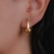 Brinco Meia Argola com Bola Lisa no Dourado