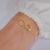 Pulseira Fio Duplo com Elos Entrelaçados no Dourado