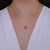Colar Letra de Microzirconias com Zirconia Quadrada no Dourado com Rosa Claro na internet