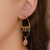 Brinco Argola com Elos e Cristais Coloridos no Meio e Gota Pendurada no Dourado - comprar online