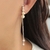 Brinco Ear Hook com Pérolas, Correntes e Tiffanys na Ponta no Ródio Branco