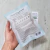 Esponja facial blanca 100% Konjac en paquete, ideal para todo tipo de piel.