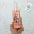 Botella de Desenre2 de NIC Kids, desenredante instantáneo para cabellos, en tono rosa, con etiquete que menciona su uso contra piojos y liendres.