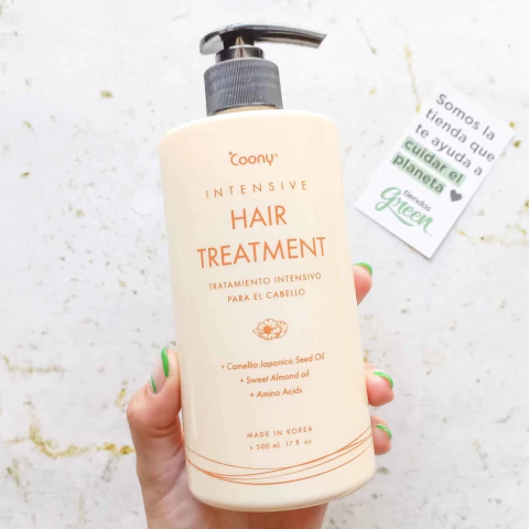 Envase del tratamiento capilar intensivo Coony para cabello dañado y seco, con ingredientes como aceite de semilla de Camellia Japonica y aceite de almendras dulces.