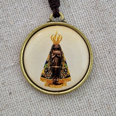 Chaveiro Dezena de Nossa Senhora Aparecida 10 mm | Ouro Velho e Branco na internet