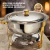 Rechaud dourado RM redondo em aço inox com tampa, sobre uma mesa, ideal para buffet destacando sua elegância e sofisticação