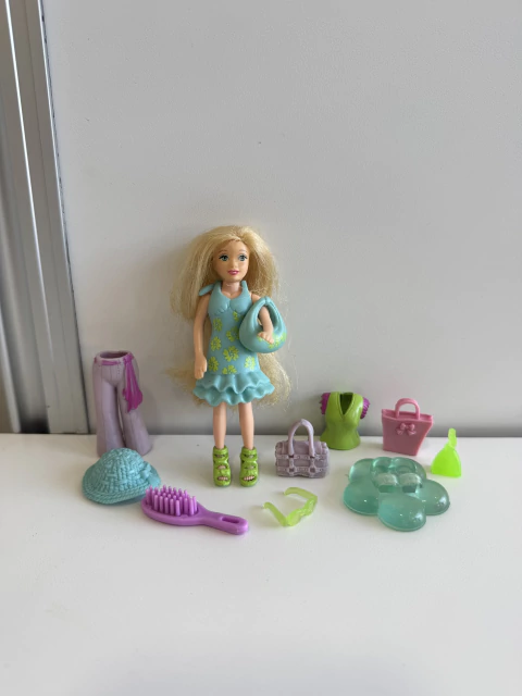 Muñeca Polly pocket con accesorios