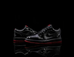 Image of Jordan Retro Low Negro Suela Roja Sku.049