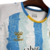 Camisa Málaga Home 24/25 - Torcedor Hummel Masculina - Azul e branca com detalhes em amarelo - DNL Sportline | Camisas de Futebol