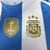 CAMISA I ARGENTINA + PATCH 24/25 - JOGADOR MASCULINA - BRANCO na internet