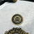 CAMISA MANGA LONGA EDIÇÃO ESPECIAL 100 ANOS MANCHESTER UNITED - RETRÔ MASCULINA - BRANCA/DOURADO na internet