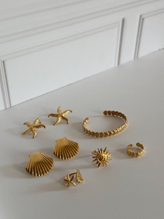 Anillo estrella y concha en internet