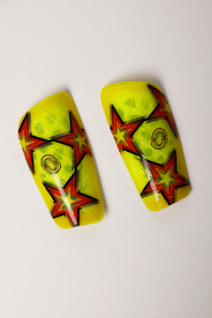 CANILLERAS NIKE ESTRELLA - comprar online
