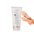Embalagem do produto Spa - Gommage Peeling para os Pés com pés ao fundo.