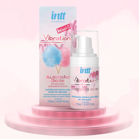 Gel vibrador líquido Vibration Power Algodão Doce da Intt Cosméticos com embalagem e frasco em fundo rosa