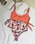 Bikini Clivia Coral con violetas en internet