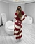 Conjunto vestido e sobretudo na internet