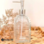 Imagen de Dispenser Jabon liquido de Vidrio con Pico Metal Código 83099