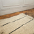 Alfombra con rayas negras 45x60cm - tienda online