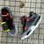 AIR JORDAN IV - cinza e vermelho na internet