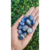 Pacote com 100 gramas de Quartzo Azul Rolado - Calma e tranquilidade - comprar online