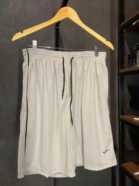 SHORT LONGO COM BOLSO ELITE