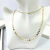 COLAR DUPLO DOURADO MEDALHAS