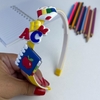 Tiara escolar com apliques