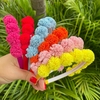 Tiara pompom fofinho