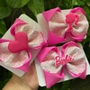 Laço Barbie rosa bebê.