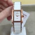 Foto mais genuína mostrando de verdade o produto Orient LTSK0005 - relógio retangular, estilo bracelete, com pulseira branca de ceramica e acabamentos em rose gold