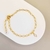 Pulseira Charmie - Banho de Ouro 18k com Pingente de Zircônia - comprar online
