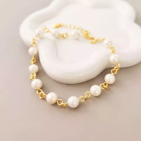 Pulseira Amélie ✦ Pérola Shell e Banho de Ouro 18k - comprar online