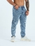 Calça Jeans OverSized Marmorizada com Destroyed no Joelho na internet