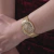 Relógio GUESS feminino dourado quadrado esteira GW0354L2 - comprar online