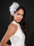 Fascinator Manhattan na internet