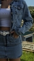 Imagem do Mini Saia Lateral Arredondada Clara - Jeans Marmorizado
