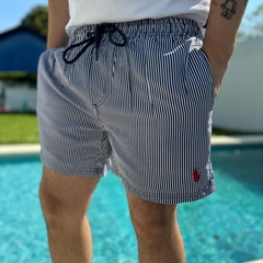 MALLA POLO RAYADA AZUL MARINO