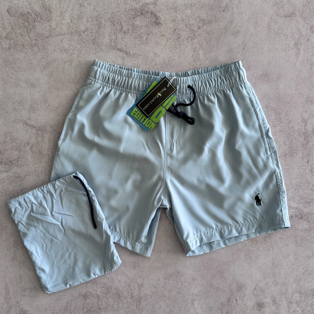 MALLA POLO LISA CELESTE