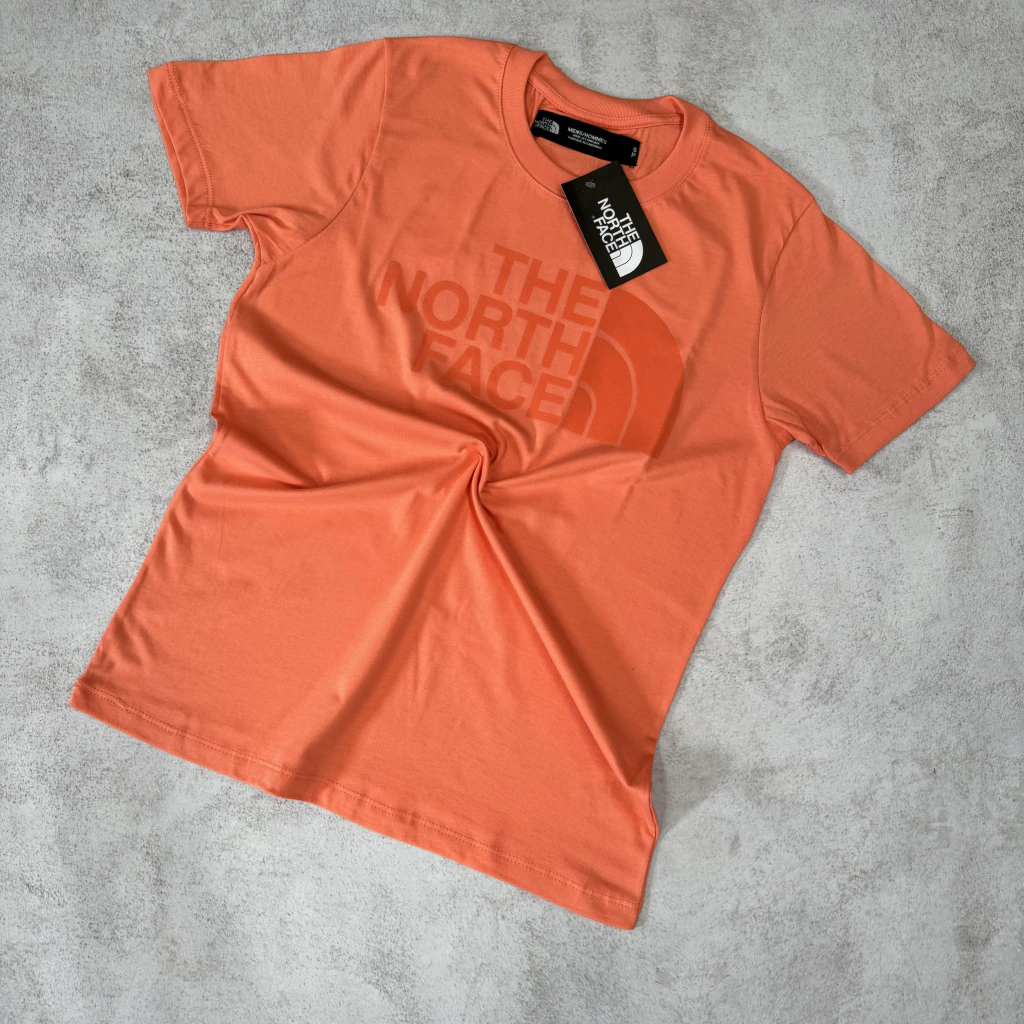 REMERA TNF ORANGE ESTAMPA AL TONO
